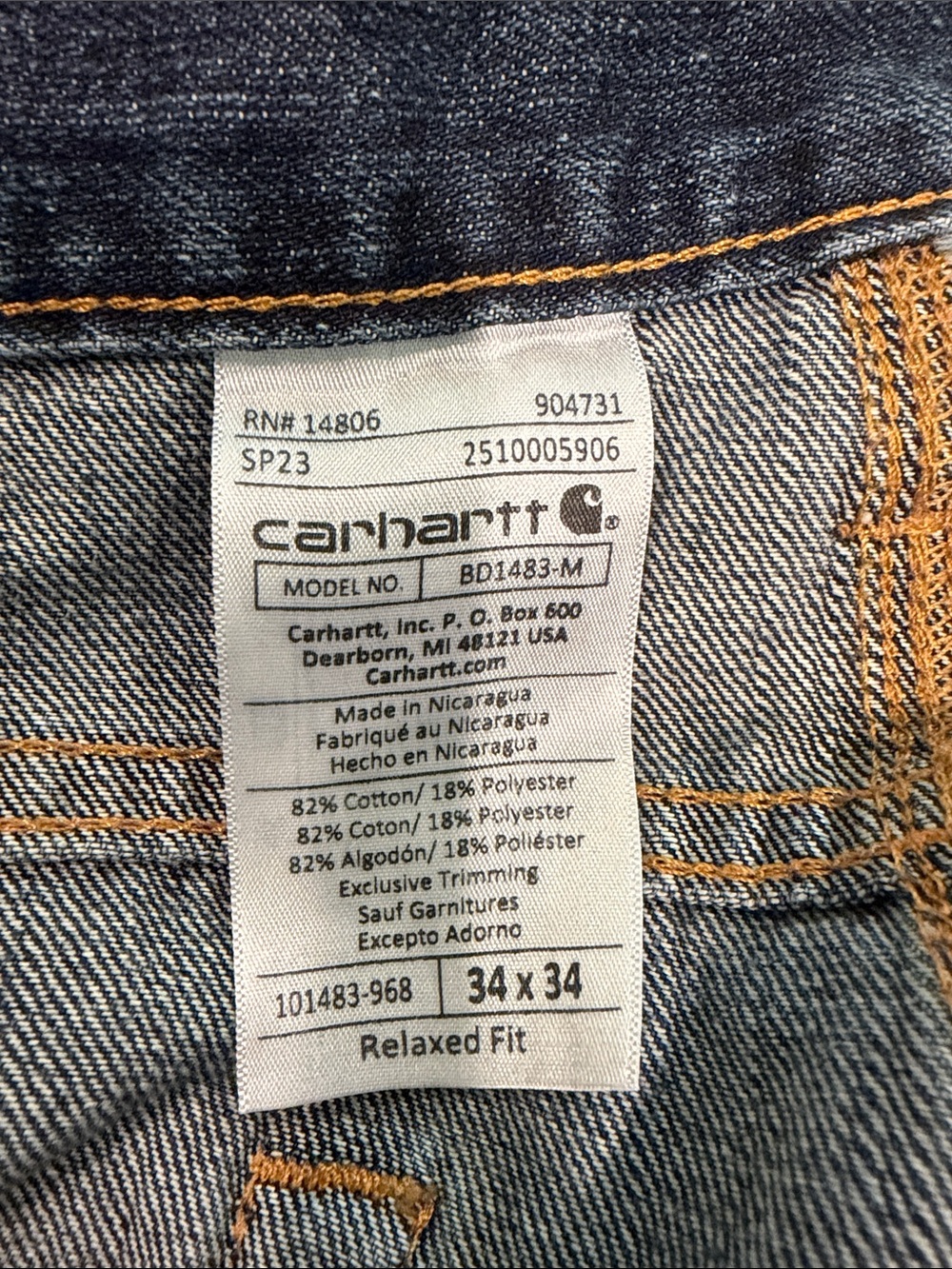 Carhartt Men's Relaxed Fit Denim Jeans in Dark Blue with Contrast Stitching